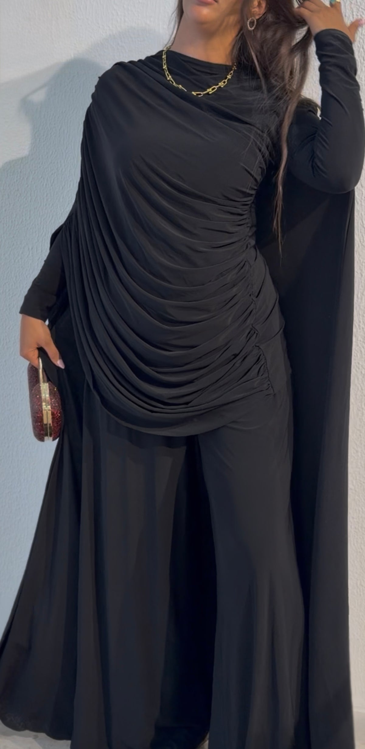 Black draped cape-sleeve gown